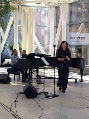 Paula Monsalve singer songwriter performing at the Arts Garden in Indianapolis, Indiana from Linares Chile