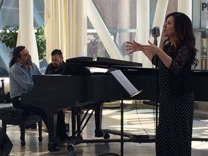 Paula Monsalve singer songwriter performing at the Arts Garden in Indianapolis, Indiana from Linares Chile