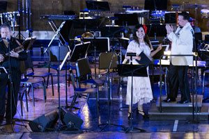 Paula Monsalve singer songwriter performing at the Marion Philharmonic Orchestra in Marion, Indiana from Linares Chile